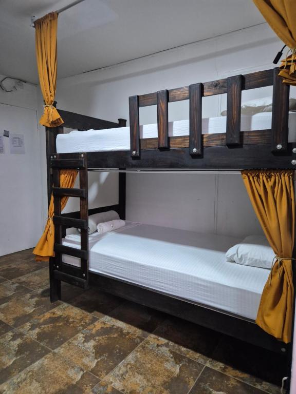 Postel nebo postele na pokoji v ubytování Eco Stay Hostel