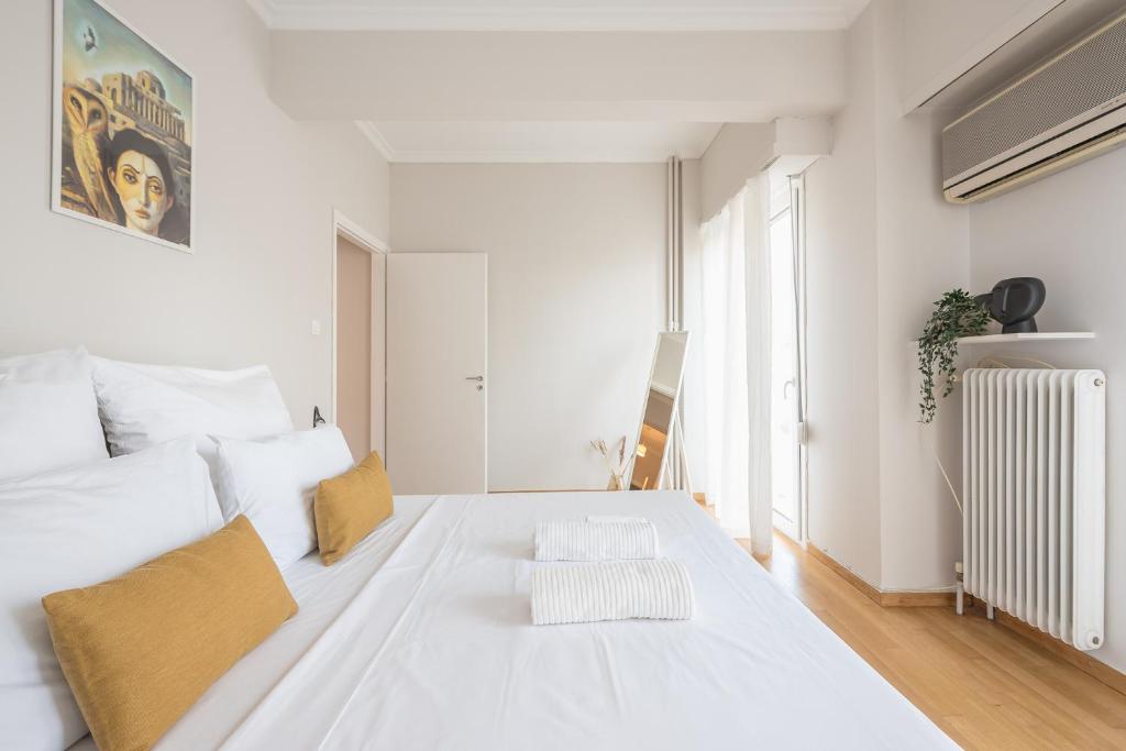 Voodi või voodid majutusasutuse Spacious 2BDs Apt With Acropolis View In Center toas