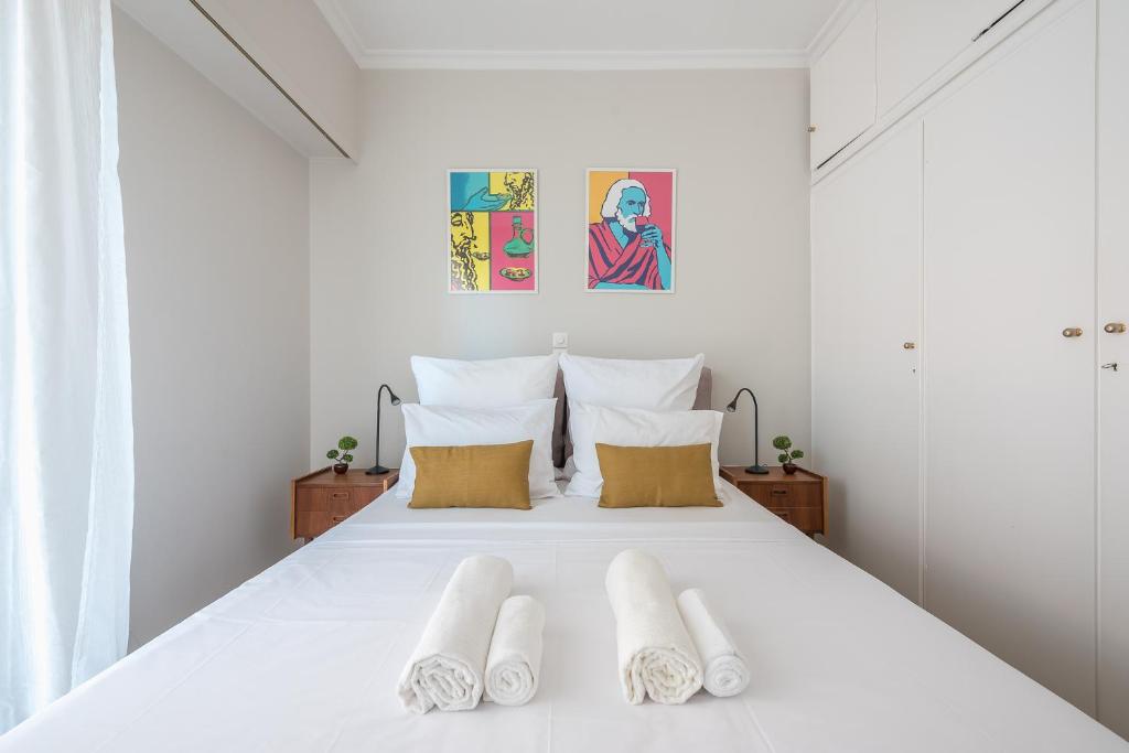 Voodi või voodid majutusasutuse Spacious 2BDs Apt With Acropolis View In Center toas