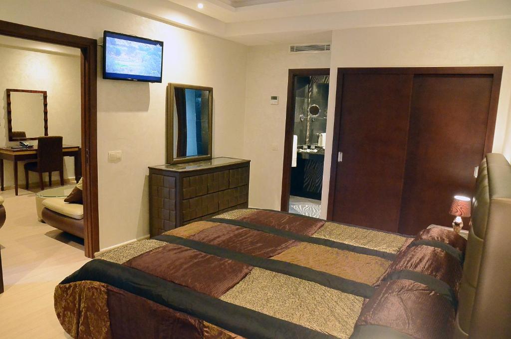 Postel nebo postele na pokoji v ubytování Hotel Chams
