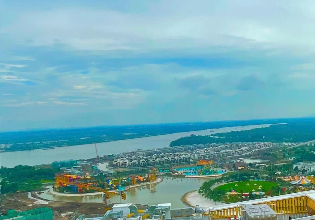 an aerial view of a river and a city at Căn hộ Studio GH2 Vinhomes Grand Park in Long Bình
