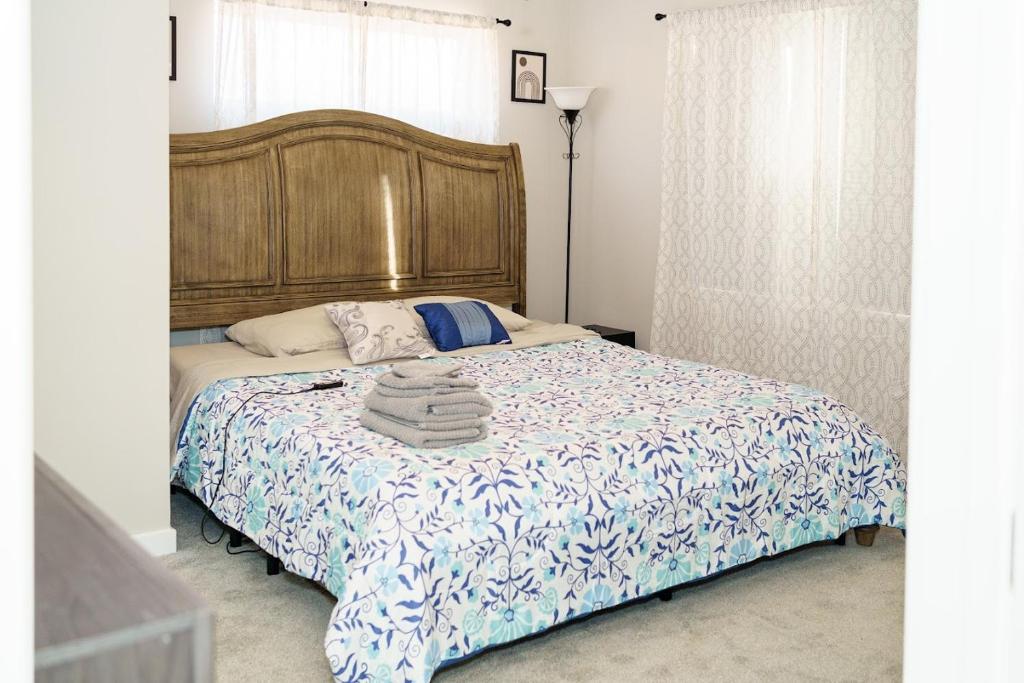 a bedroom with a bed with towels on it at Hidden Gem 2 in Norristown