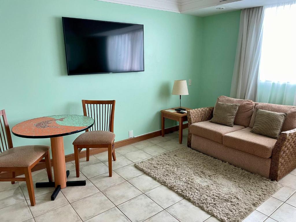 TV a/nebo společenská místnost v ubytování Flat no Tropical - Linda Vista do Rio