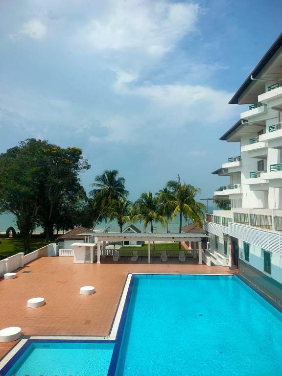 Bazén v ubytování Akar Beach Resort nebo v jeho okolí