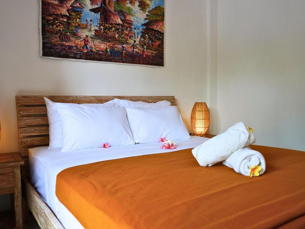 Postel nebo postele na pokoji v ubytování Summer of Surf Hostel Uluwatu