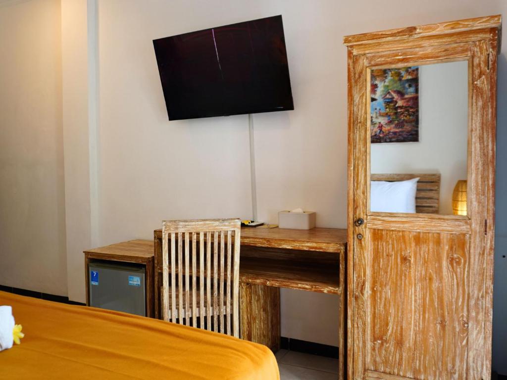 TV a/nebo společenská místnost v ubytování Summer of Surf Hostel Uluwatu