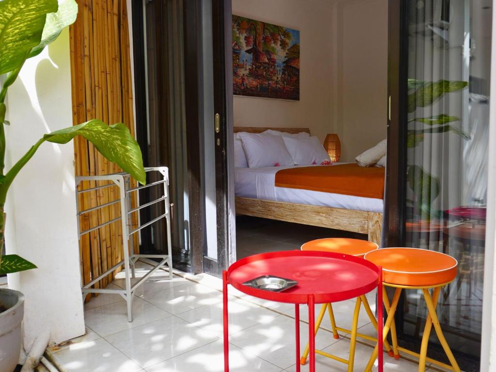 Postel nebo postele na pokoji v ubytování Summer of Surf Hostel Uluwatu