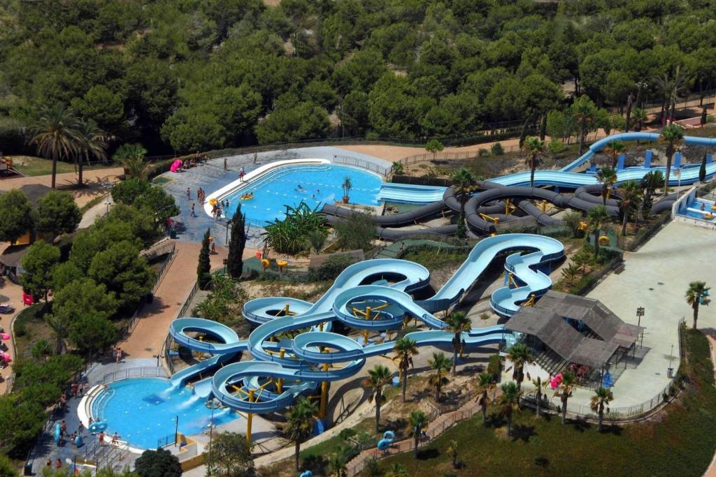 Bazén v ubytování tico En Exclusivo Complejo En La Playa De Vera nebo v jeho okolí