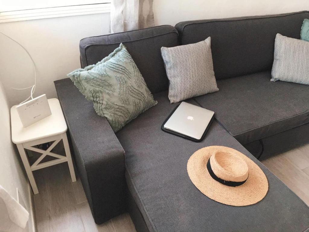 A seating area at Calma apartment On the most amazing beach in Fuerteventura