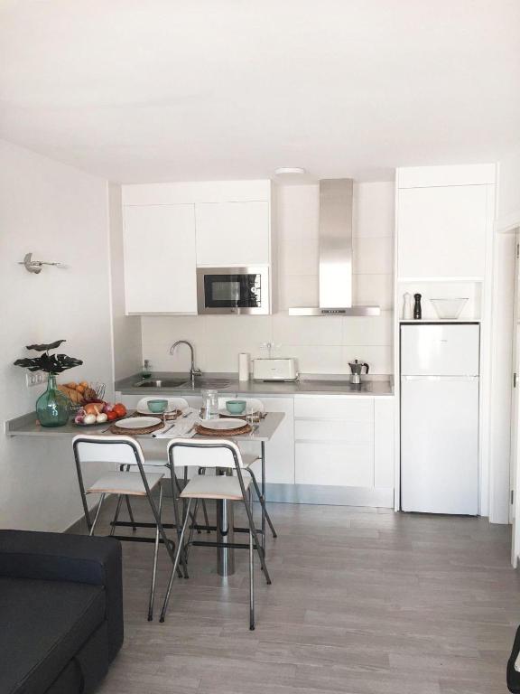 A kitchen or kitchenette at Calma apartment On the most amazing beach in Fuerteventura