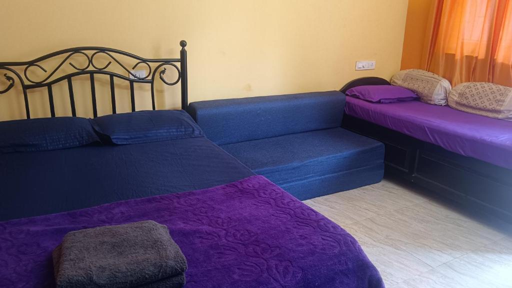 Postel nebo postele na pokoji v ubytování Beach Shalom Luxury Apartment and Villa Colva