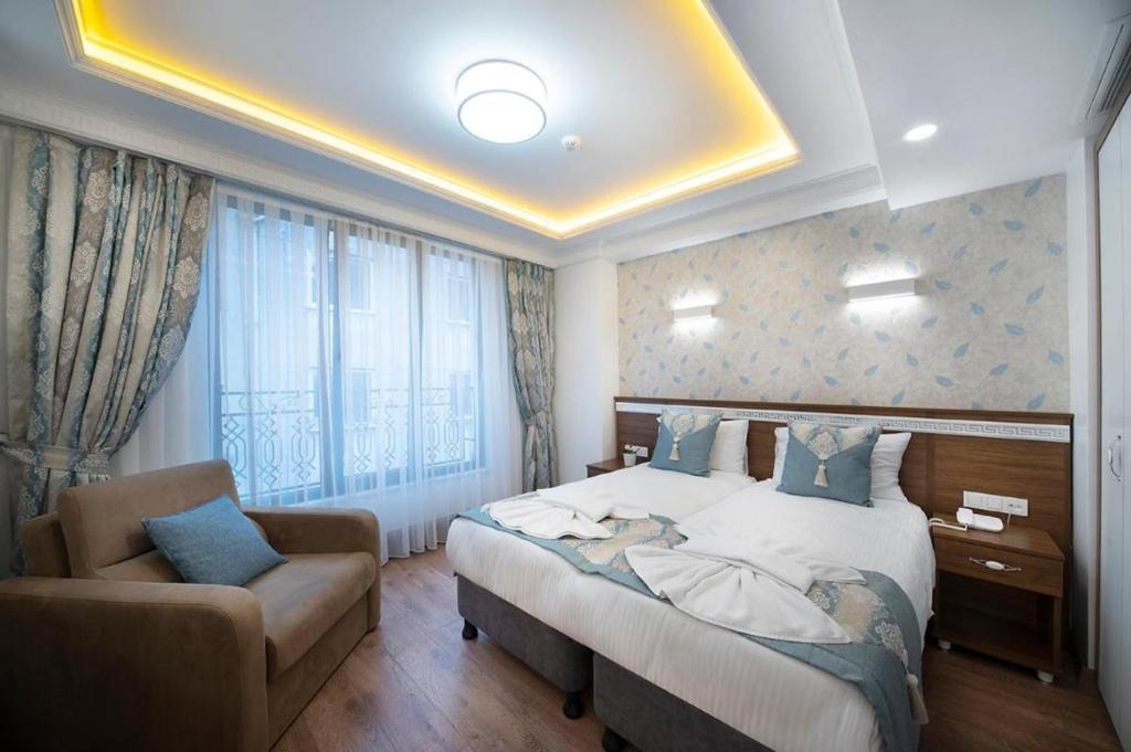 Postel nebo postele na pokoji v ubytování Room in Guest room - Lika Hotel - Superior Double or Twin Room - Luxury in Istanbul Center