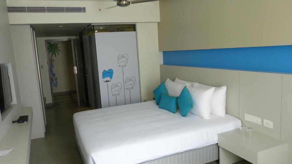 Postel nebo postele na pokoji v ubytování ZIBE Coimbatore by GRT Hotels