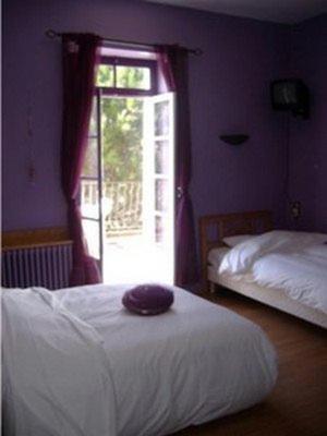 Postel nebo postele na pokoji v ubytování Auberge de l'Escargot d'Or