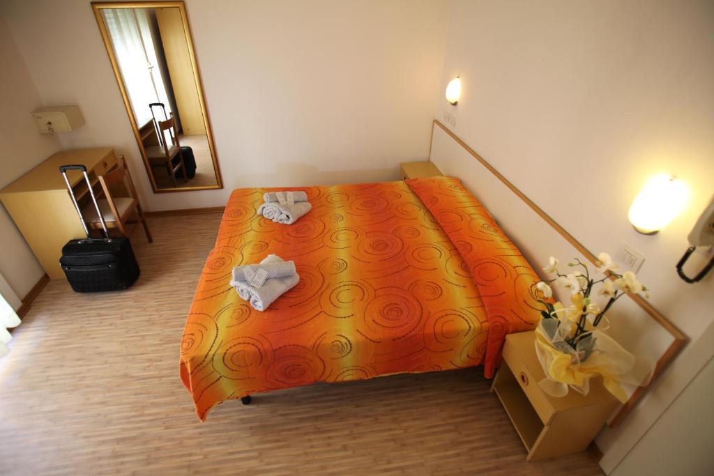 Postel nebo postele na pokoji v ubytování Hotel Ritter