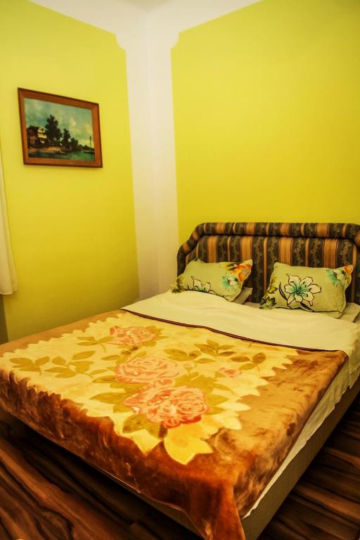 Postel nebo postele na pokoji v ubytování Rooms Cristal Roche