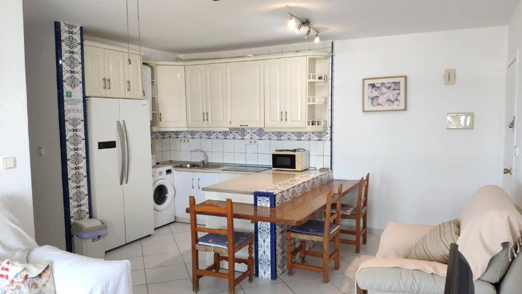 A kitchen or kitchenette at Don Paco - Front Line Of The Beach Apartment