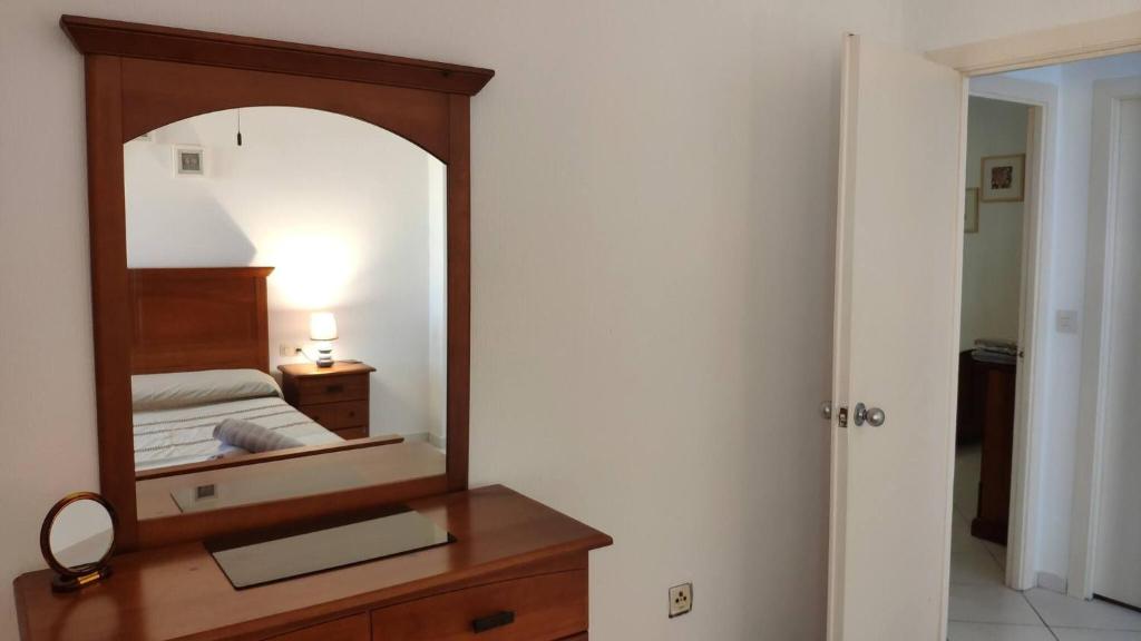 A bed or beds in a room at Don Paco - Front Line Of The Beach Apartment