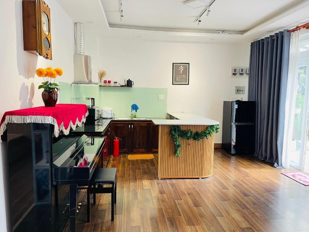 a kitchen with a counter top in a room at Trà duyên Homestay in Da Lat