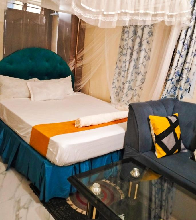Postel nebo postele na pokoji v ubytování KANAPRIME-Studio Apartment