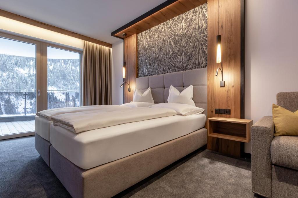 Posteľ alebo postele v izbe v ubytovaní Hotel Post Kappl