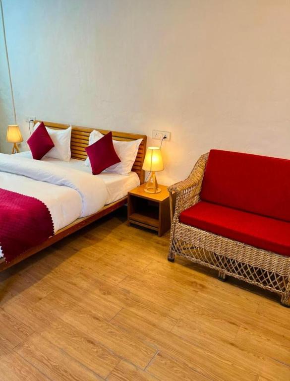 Postel nebo postele na pokoji v ubytování Nishantam Boho Mussoorie