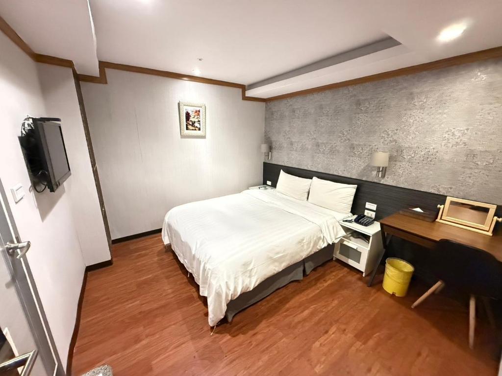 TV a/nebo společenská místnost v ubytování 漫旅時光旅店