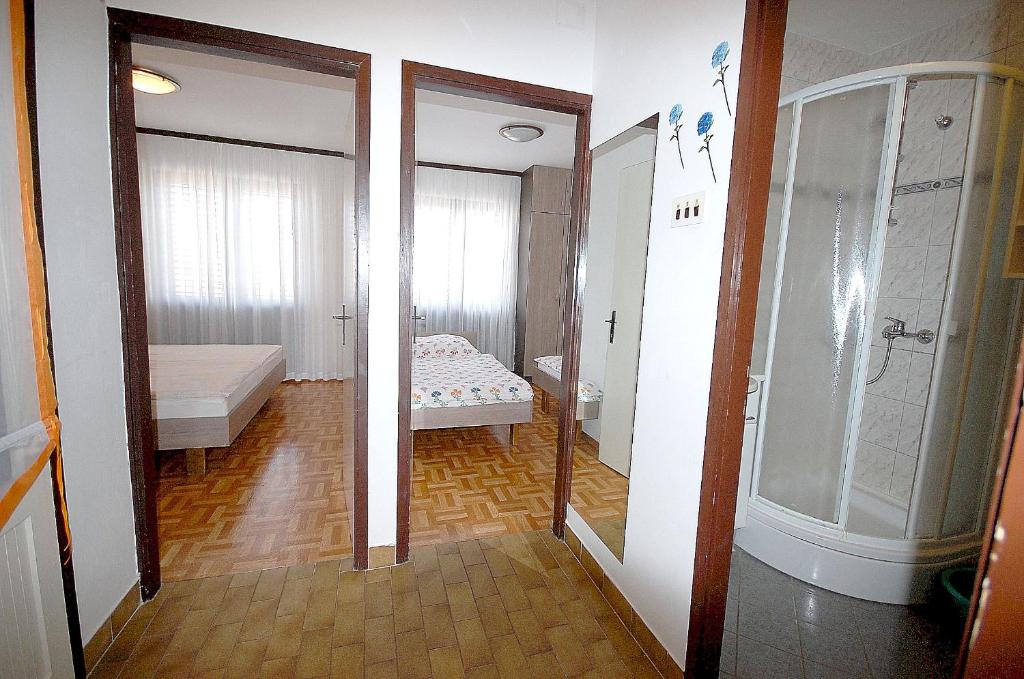 Posteľ alebo postele v izbe v ubytovaní Apartments Jakobi by El-Pi Tours