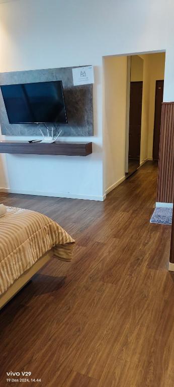TV a/nebo společenská místnost v ubytování villa view2 sayriah