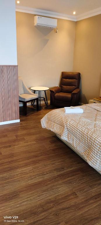 Postel nebo postele na pokoji v ubytování villa view2 sayriah