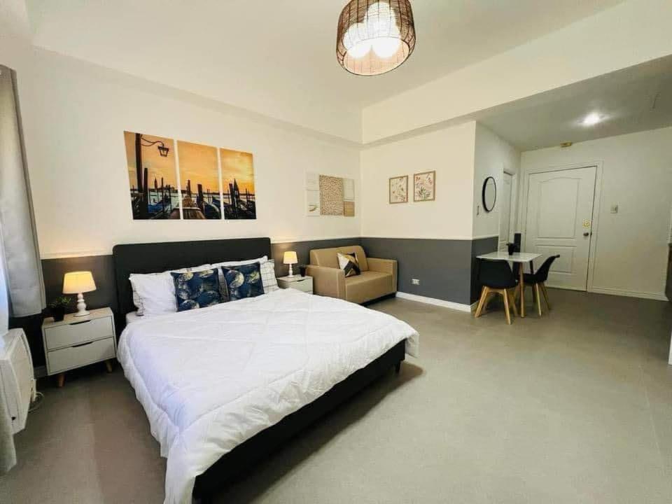Postel nebo postele na pokoji v ubytování 2-4pax Condo Unit in Subic Bay