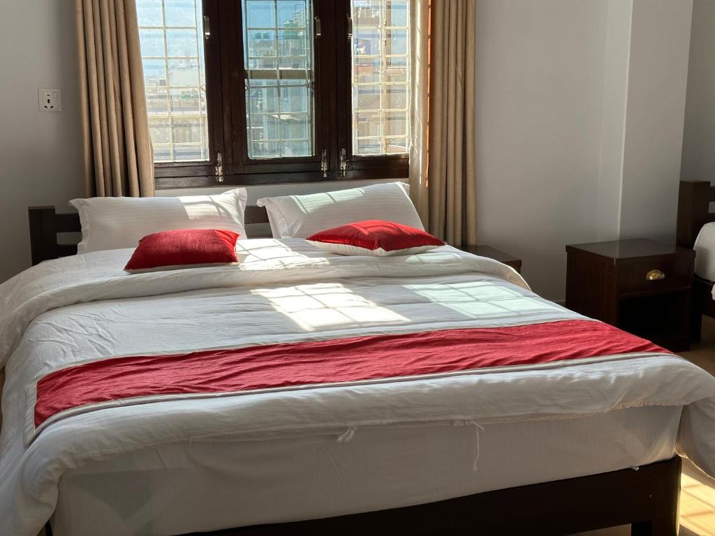 Llit o llits en una habitació de Hotel Bhagya