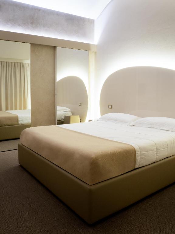 Postel nebo postele na pokoji v ubytování Dealuna Motel