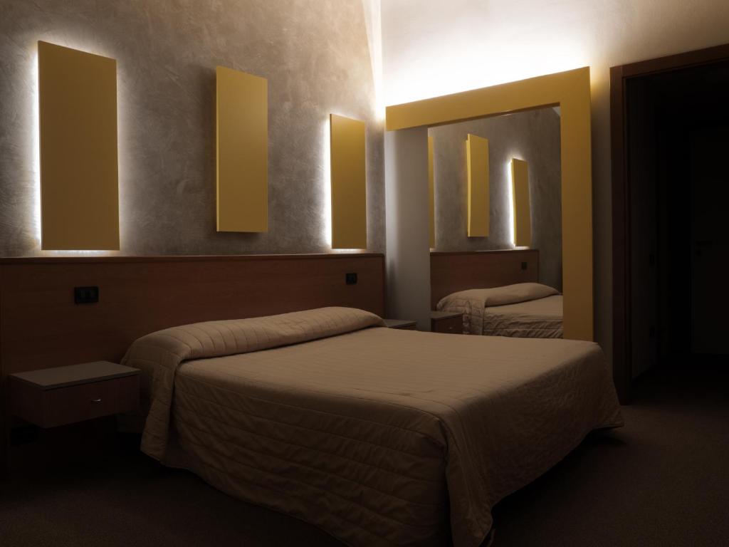 Postel nebo postele na pokoji v ubytování Dealuna Motel