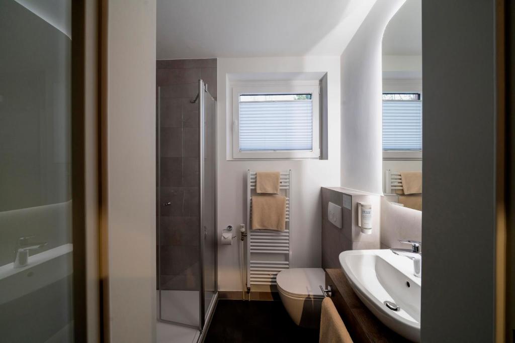 Postel nebo postele na pokoji v ubytování Hotel zur Post