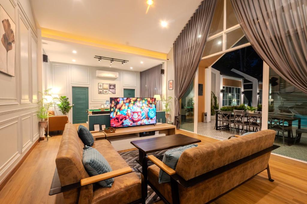 Posezení v ubytování The Sand and I Private Pool Villa Huahin