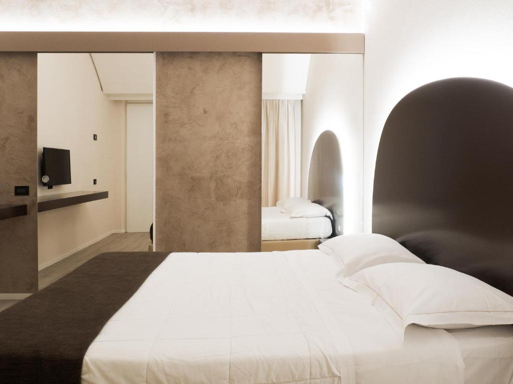 Postel nebo postele na pokoji v ubytování Dealuna Motel