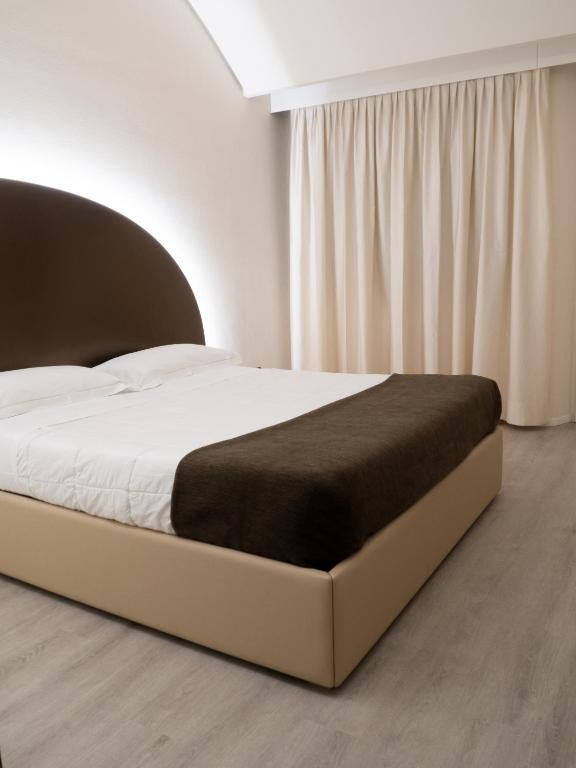Postel nebo postele na pokoji v ubytování Dealuna Motel