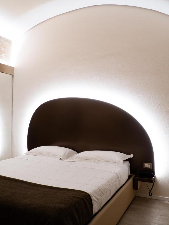Postel nebo postele na pokoji v ubytování Dealuna Motel