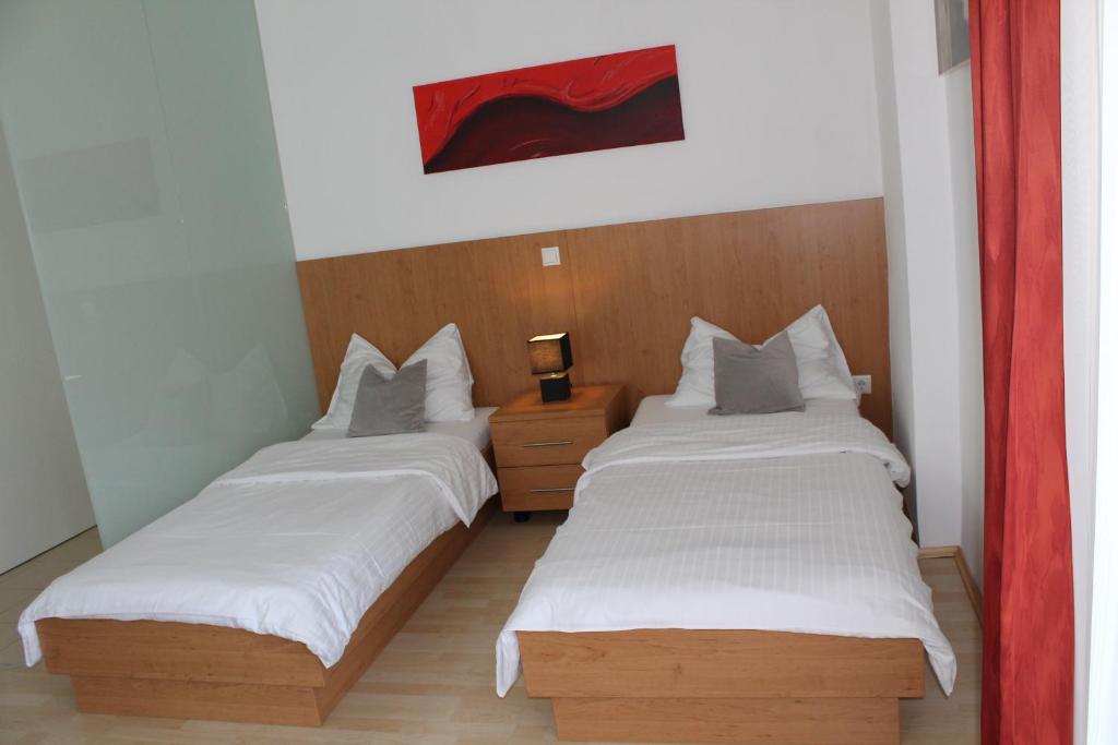 Postel nebo postele na pokoji v ubytování Pension Steinbichler - Apartments und Zimmer Check in 24-7