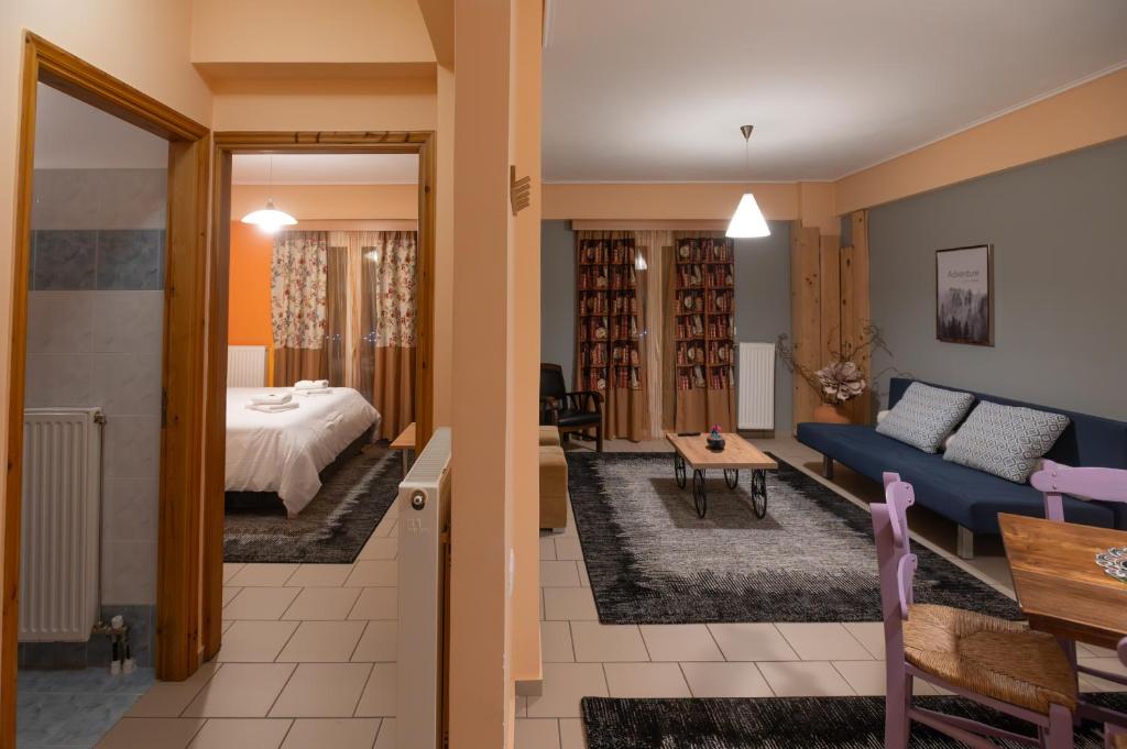 A bed or beds in a room at Xenonas Drimos