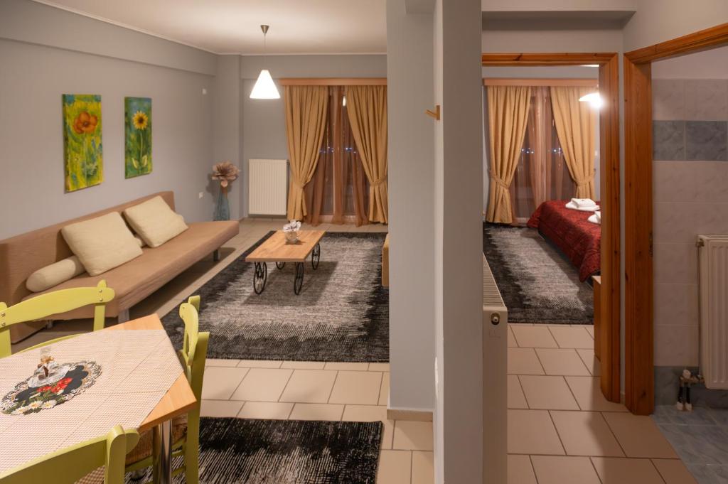A bed or beds in a room at Xenonas Drimos