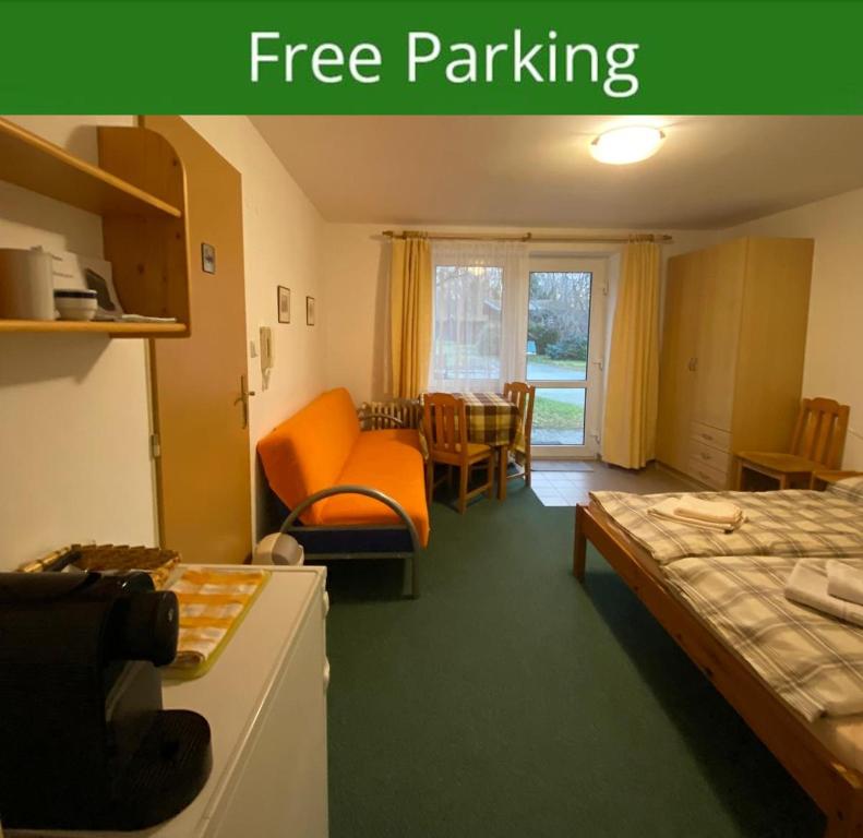 Postel nebo postele na pokoji v ubytování Apartment Trojska