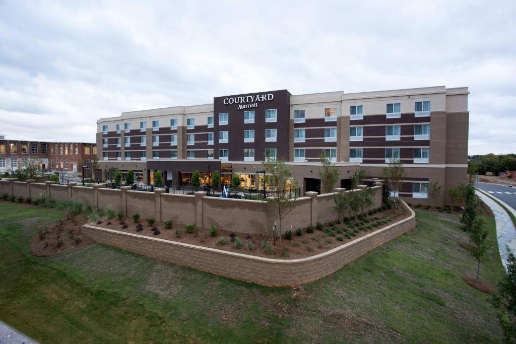a rendering of a hospital building at Courtyard by Marriott Starkville MSU at The Mill Conference Center in Starkville