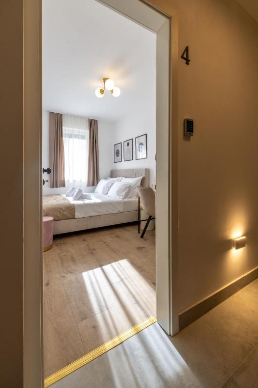 Postel nebo postele na pokoji v ubytování Kala Rooms