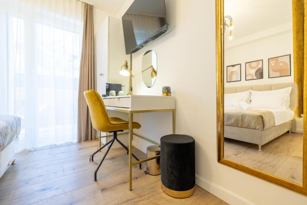 Postel nebo postele na pokoji v ubytování Kala Rooms