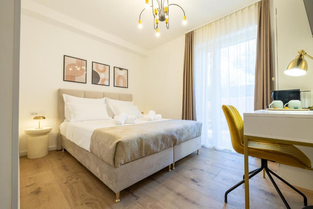 Postel nebo postele na pokoji v ubytování Kala Rooms