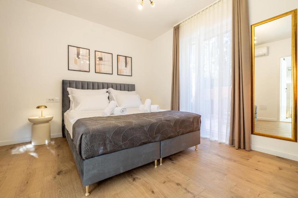 Postel nebo postele na pokoji v ubytování Kala Rooms