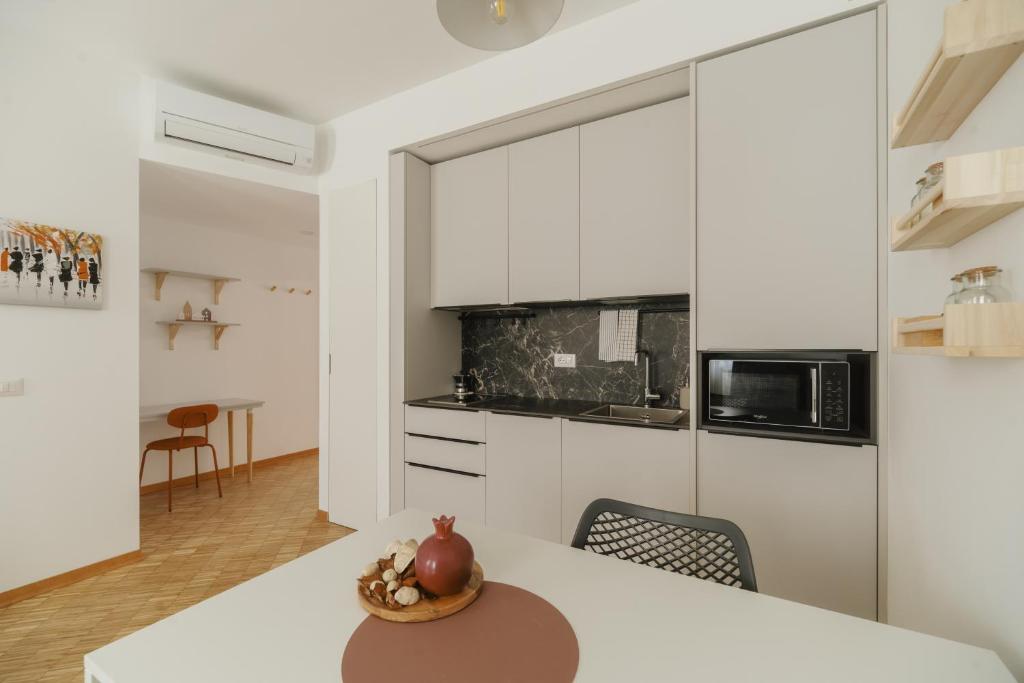Kuchyňa alebo kuchynka v ubytovaní Residence Degli Aranci - Casêta