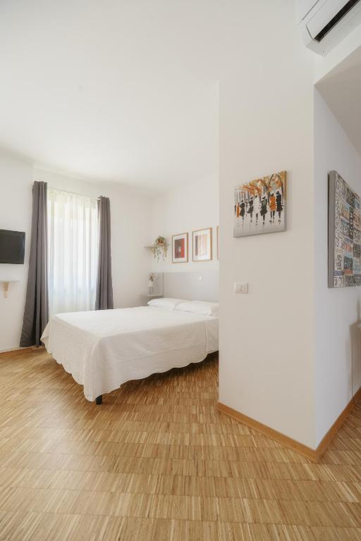 Posteľ alebo postele v izbe v ubytovaní Residence Degli Aranci - Casêta